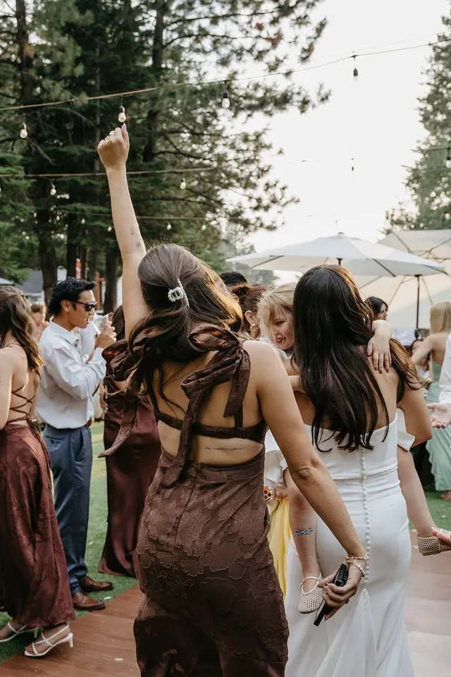 A woman dancing at a wedding reception